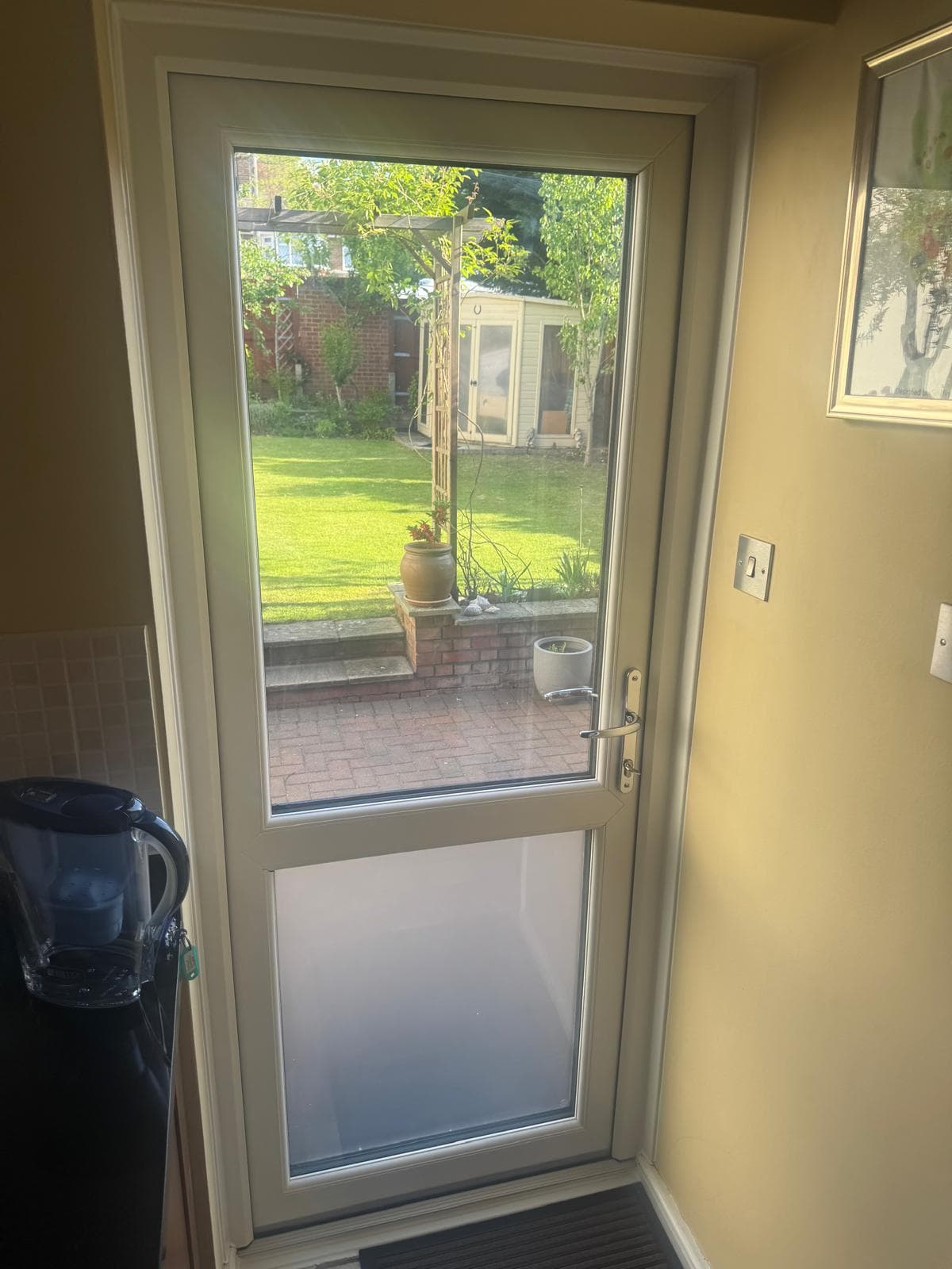 uPVC single door with toplight