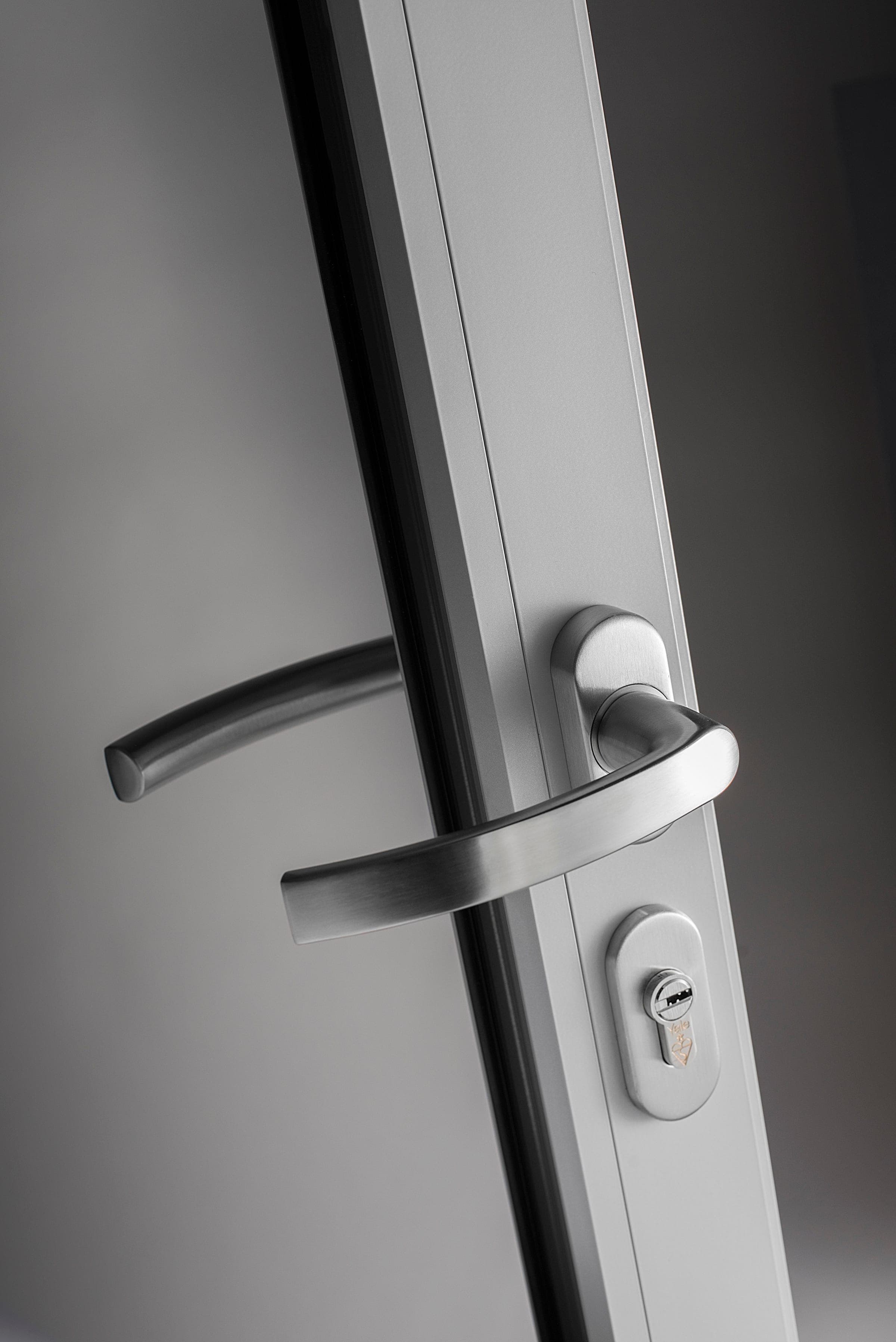 Origin OW-80 Premium window handle and frame detail close-up showing internal-and-external flush casement