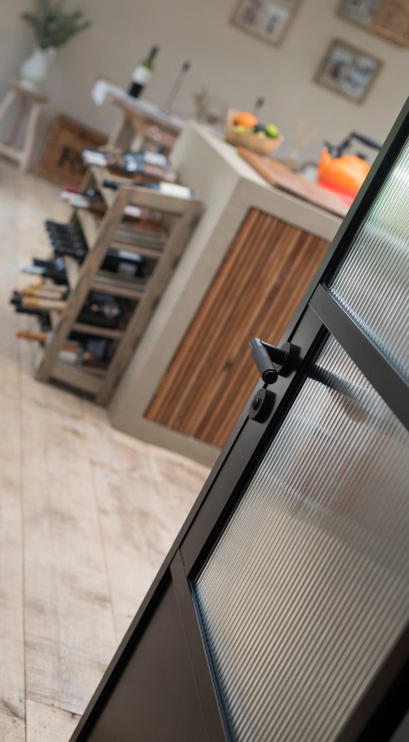 Origin OI-30 Internal Door used as a glass room divider in a broken-plan UK kitchen