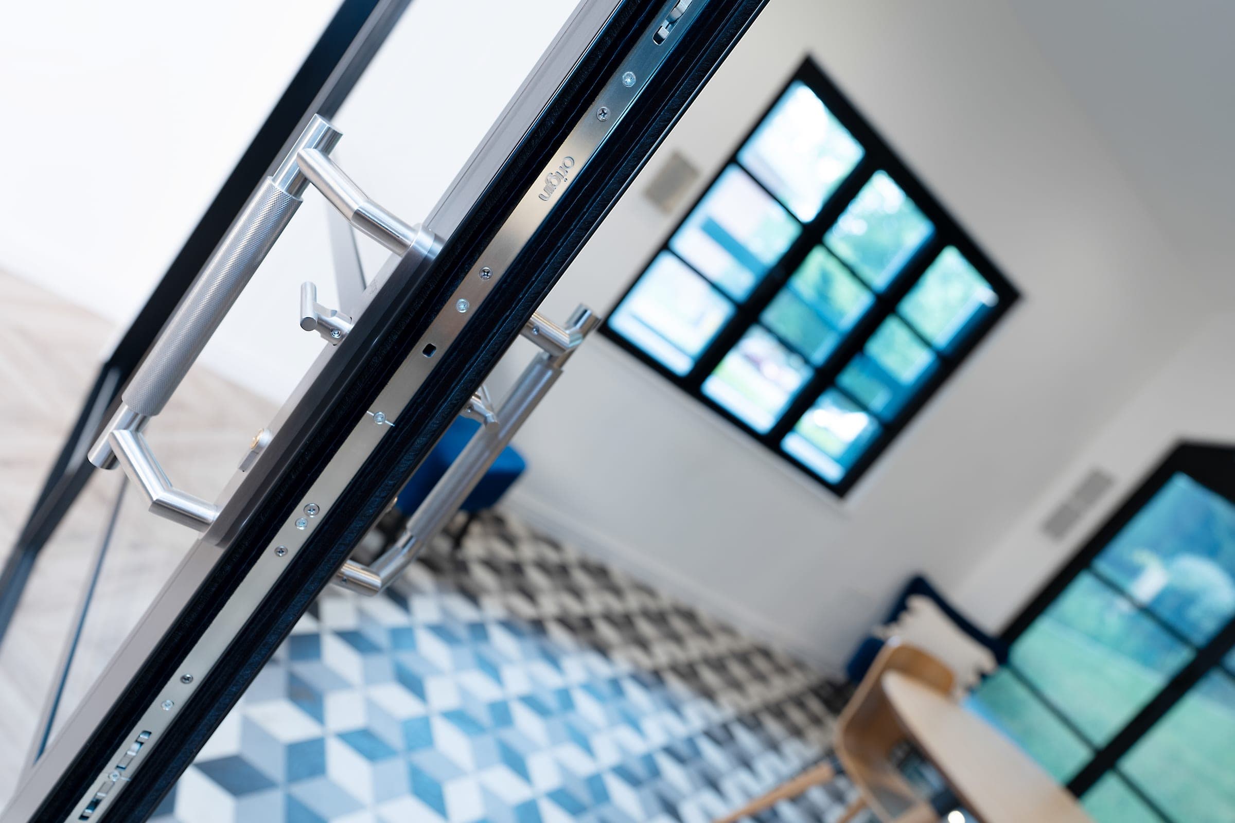 Origin OS-29+ aluminium sliding doors fitted in a contemporary residential setting