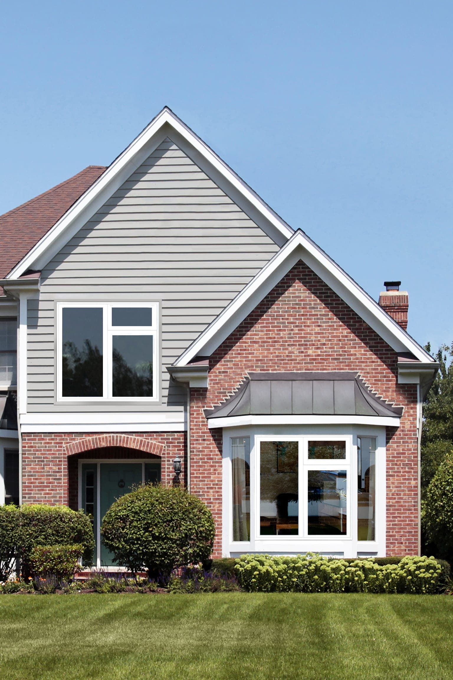 Rehau Rio flush casement uPVC windows fitted to a home exterior