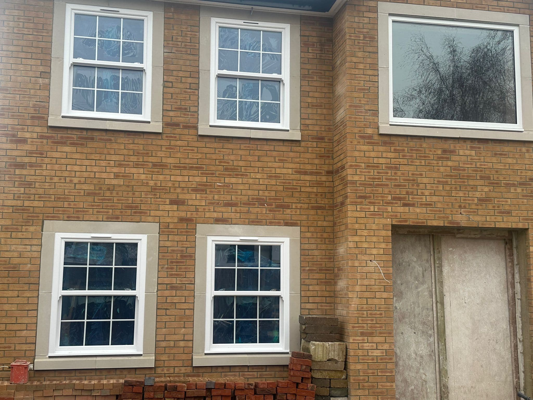 Pair of sash windows on brick