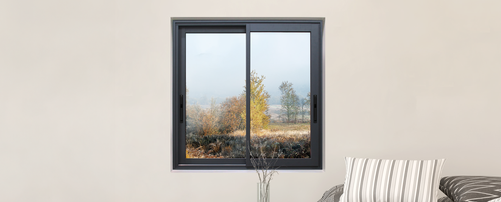 Cortizo 4900 Sliding HI aluminium sliding window in anthracite frame with garden view