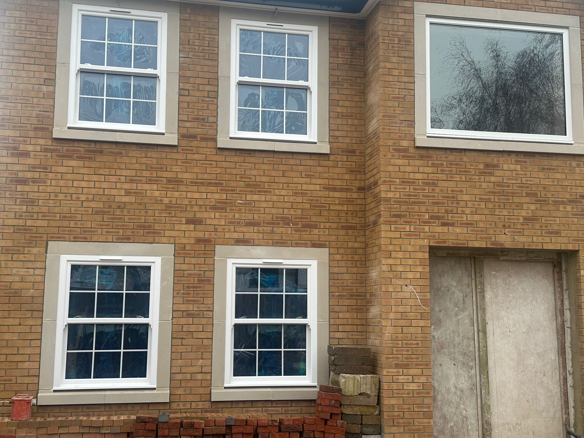 Pair of sash windows on brick